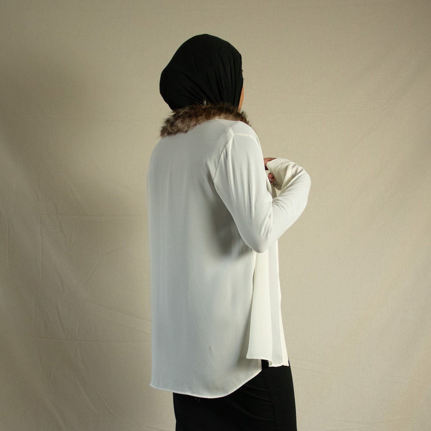 Sheer button up blouse with faux fur detail