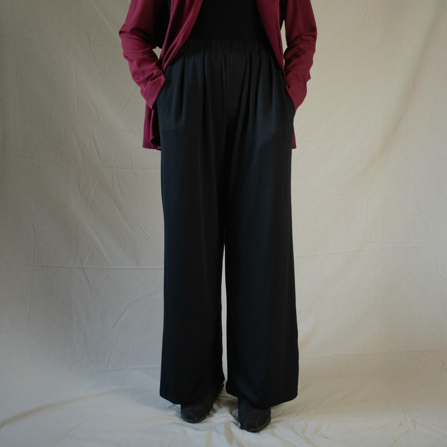 Black ribbed straight leg trousers